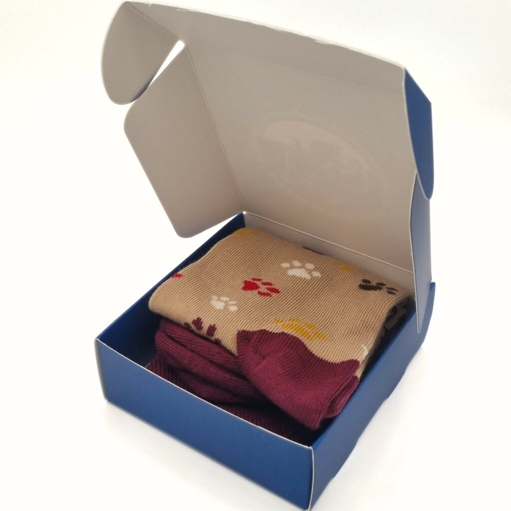 Cinnamon Trust Paw Print Socks from the Cinnamon Trust Charity Webshop | Make a difference with every purchase