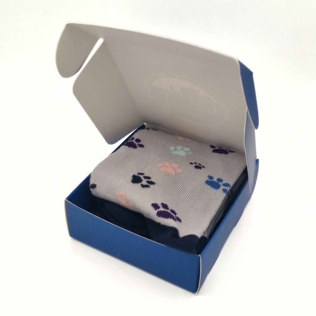 Cinnamon Trust Paw Print Socks from the Cinnamon Trust Charity Webshop | Make a difference with every purchase