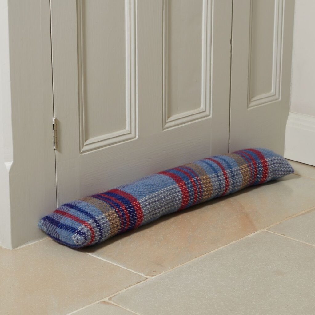 Random Recyled Wool Draft Excluder from the Cinnamon Trust Charity Webshop | Make a difference with every purchase